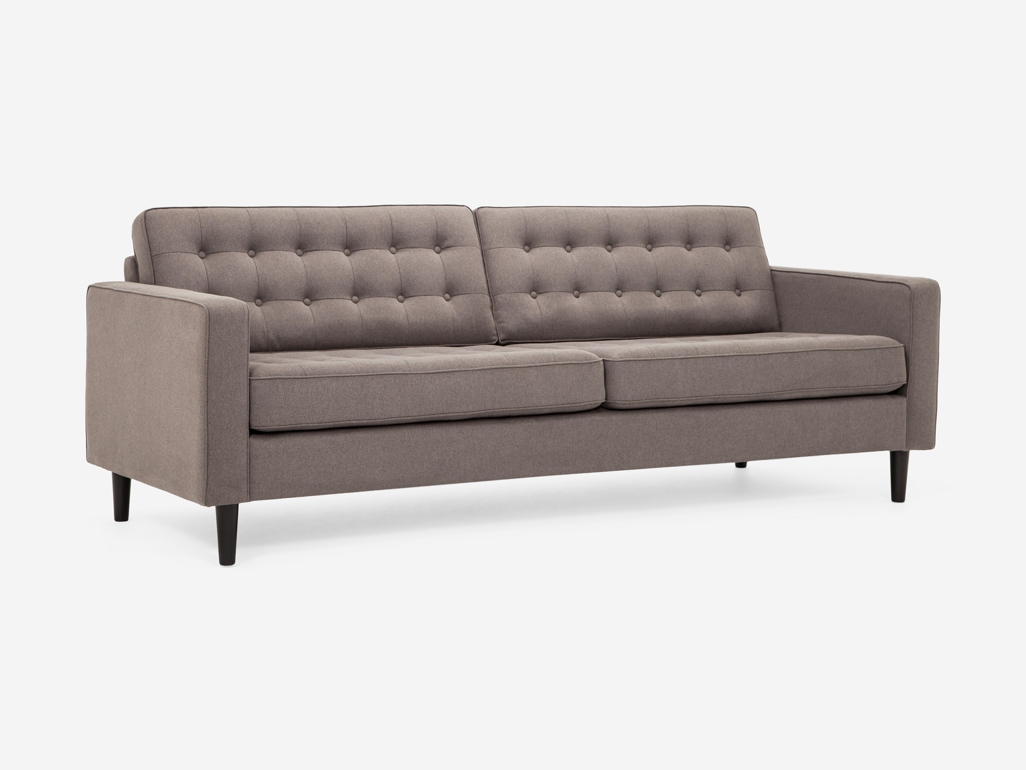 Corner view of our mid century modern sofa, the Reverie 86", upholstered in grey fabric